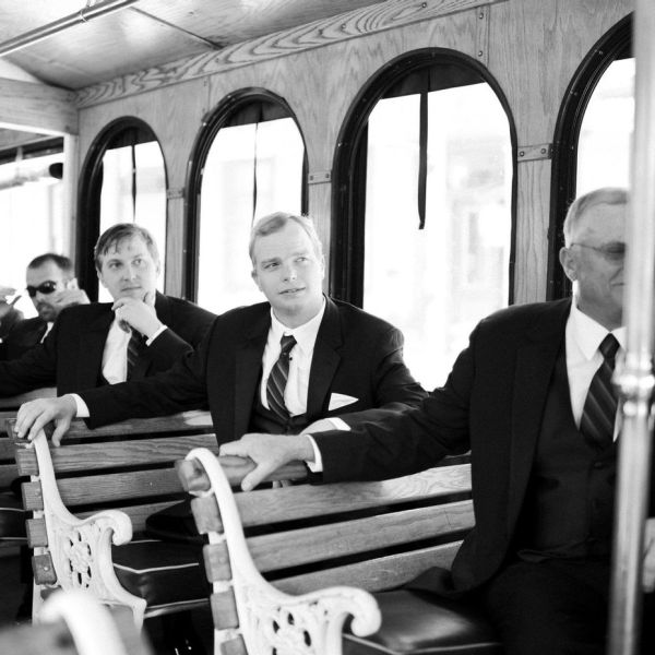 a group of people sitting on a bench