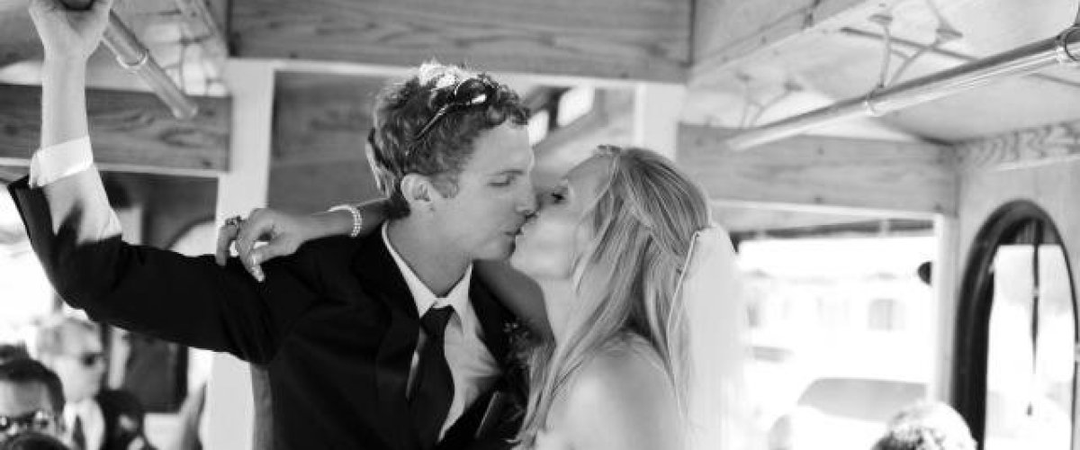 a group of people standing in a wedding dress
