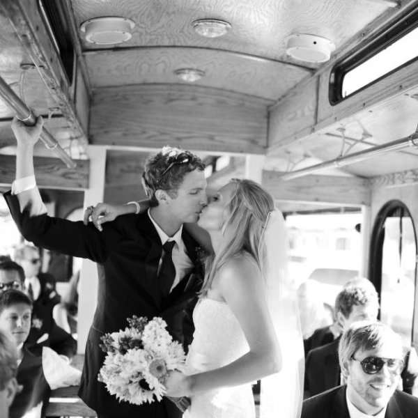 a group of people standing in a wedding dress