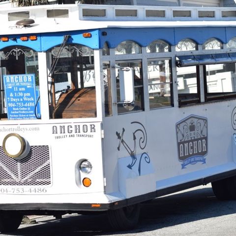 a truck parked on the side of a building